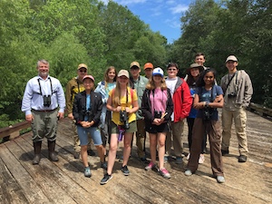 Group standing on boardwalk