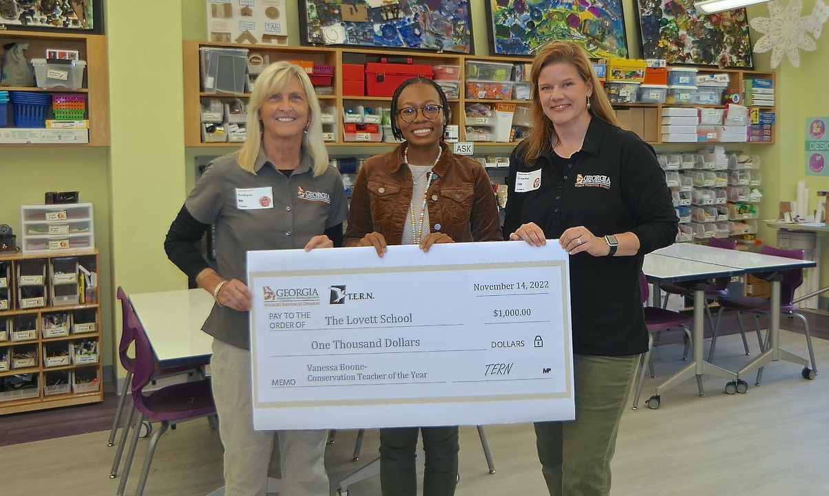 2022-23 DNR Conservation Teacher of Year grant recipient Vanessa Boone, center, with DNR's Kim Kilgore (left) and Linda May (The Lovett School)